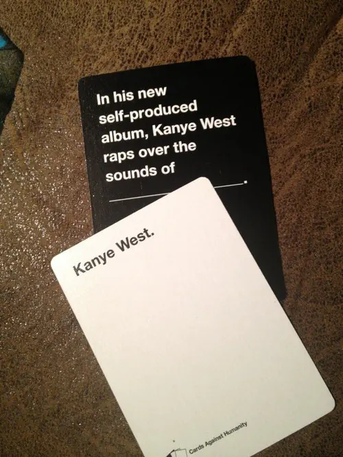 Cards Against Humanity combo. Black card: “In his new self-produced album, Kanye West raps over the sounds of (blank).” White card: “Kanye West.”