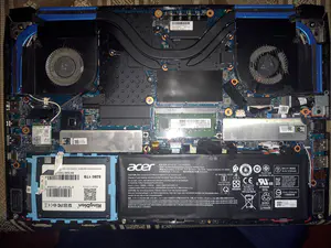 Underside of an Acer Predator Helios 300 laptop with the case cover removed.